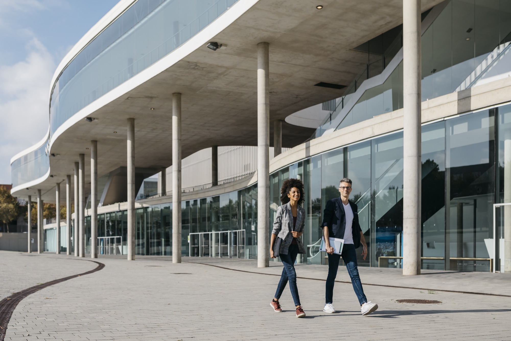 People walking outside a commercial office building